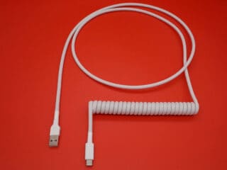 White non-detachable coiled mechanical keyboard USB cable