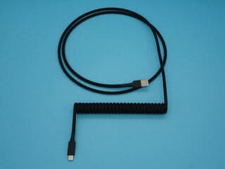 Black non-detachable coiled mechanical keyboard USB cable