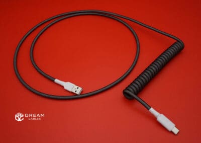 Black and white non-detachable coiled mechanical keyboard USB cable